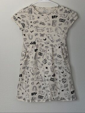 Wonder Nation Cream Dress with Black Doodle Graphics had pockets